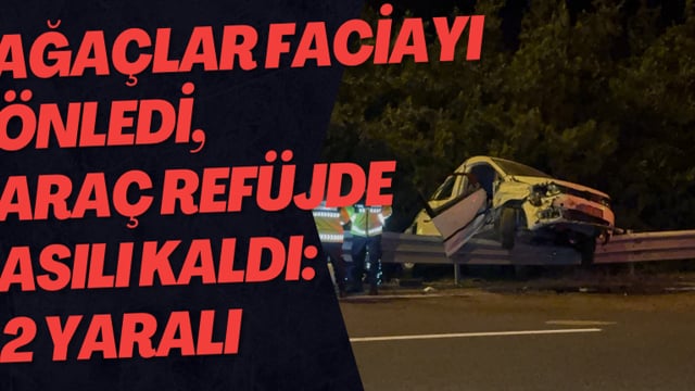 Ağaçlar Faciayı Önledi, Araç Refüjde Asılı Kaldı: 2 Yaralı