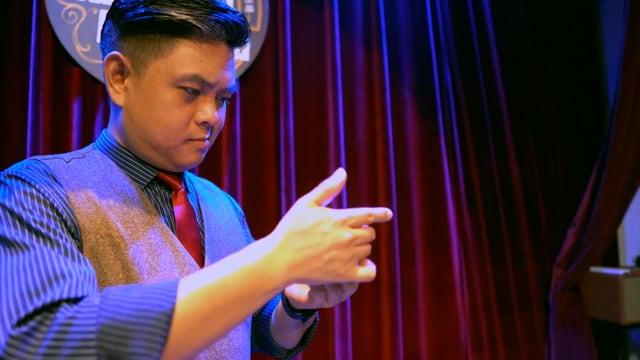 Video L Holder (Single Ball) by Long Long & Bacon Magic