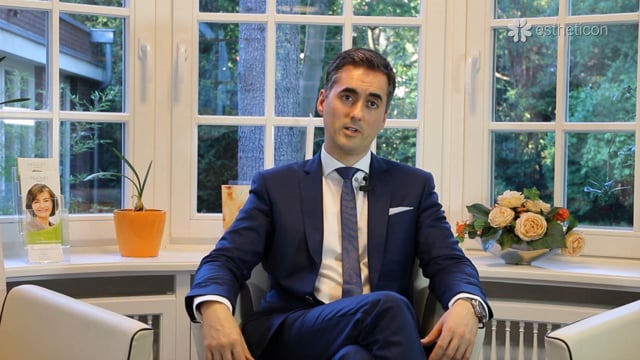 Positioning a breast implant