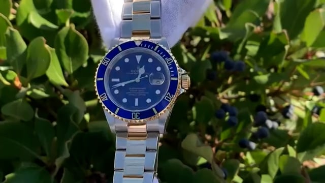 2007 Rolex Submariner Two-Tone with Blue Dial and Bezel, box, papers, and  tags.