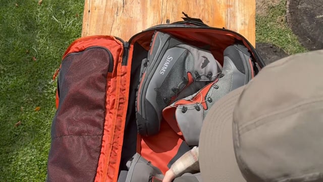 Simms Tailwind 80L Duffel Bag with spacious interior for fishing gear