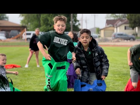 Video of students participating in outdoor competitions  like  sack races